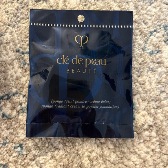 Swatched once Cle De Peau Radiant Cream to Powder Foundation. BF20. SPF 24. - Picture 3 of 5